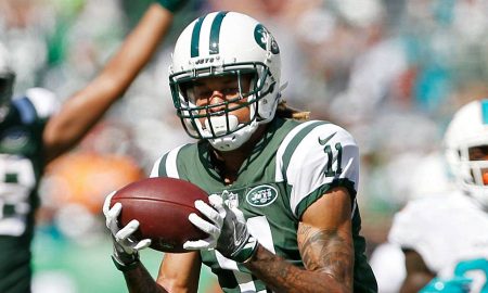 Robby Anderson in police custody, booked under 9 charges