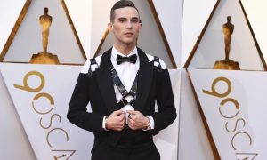 Adam Rippon seen wearing a harness at the Oscars