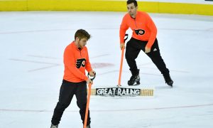 Flyers fans throw beer cans and trash on the ice during loss to Pittsburgh Penguins