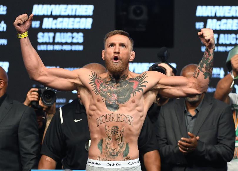 Conor McGregor charged with assault after allegedly attacking bus attack
