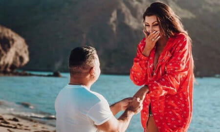 Holly Sonders Poses Topless on a Ladder in High Heels for a Photoshoot